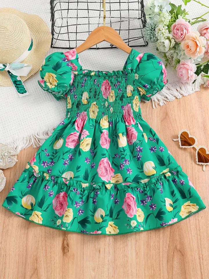 This soft green dress is made of comfortable fabric, which will add freshness and style to the little fairy's everyday outfit."1744