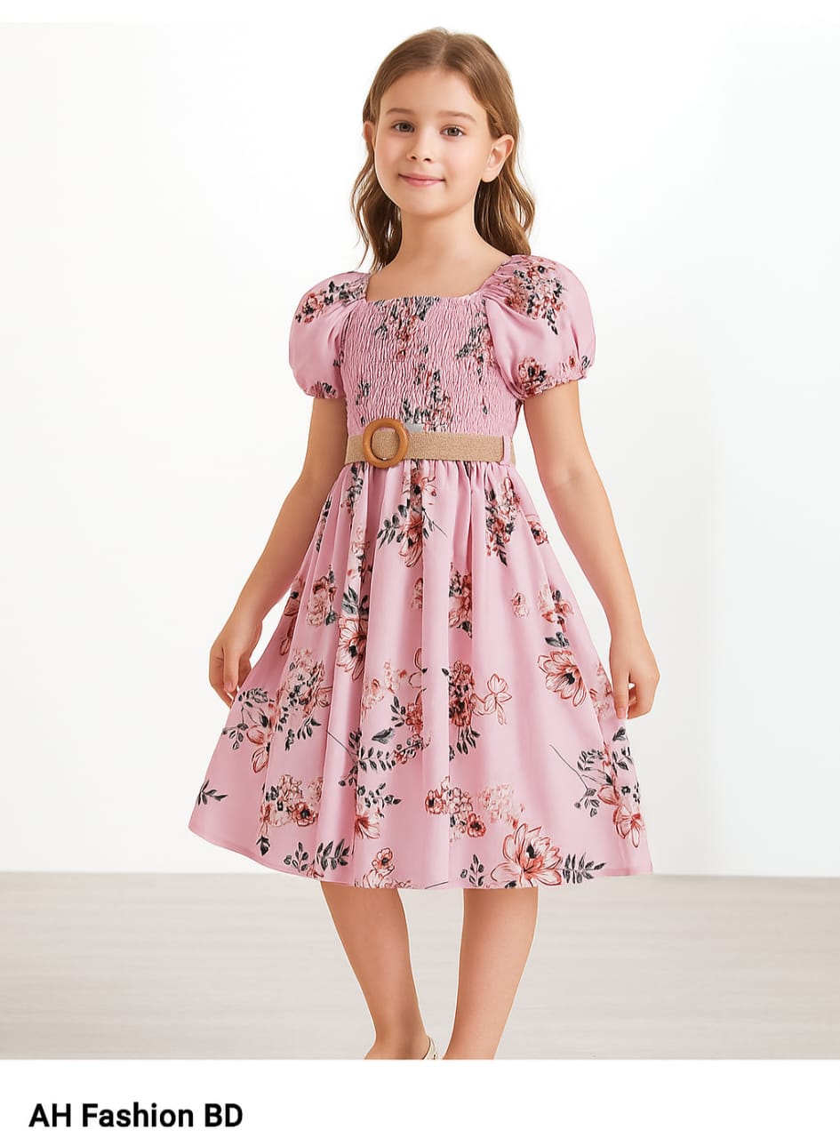 🌸 Pink Floral Puff Sleeve Dress 🌸 A charming pink dress with floral prints, puff sleeves, and a stylish belt. Featuring a smocked bodice for comfort and elegance—perfect for parties, outings, or casual wear.B-1740